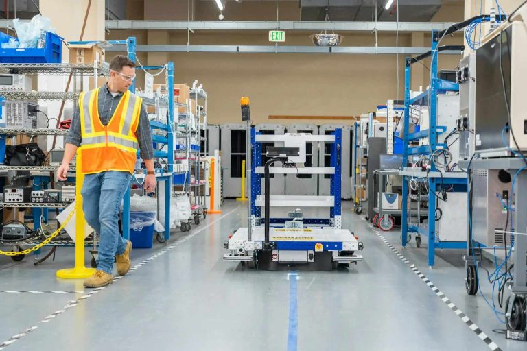 AGV Material Handling in Manufacturing Production Practical Applications for Efficiency Gains, Labor Reduction, and High-Precision Transport